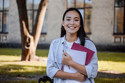 College student holding books