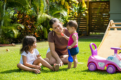 Mom and kids outside of home