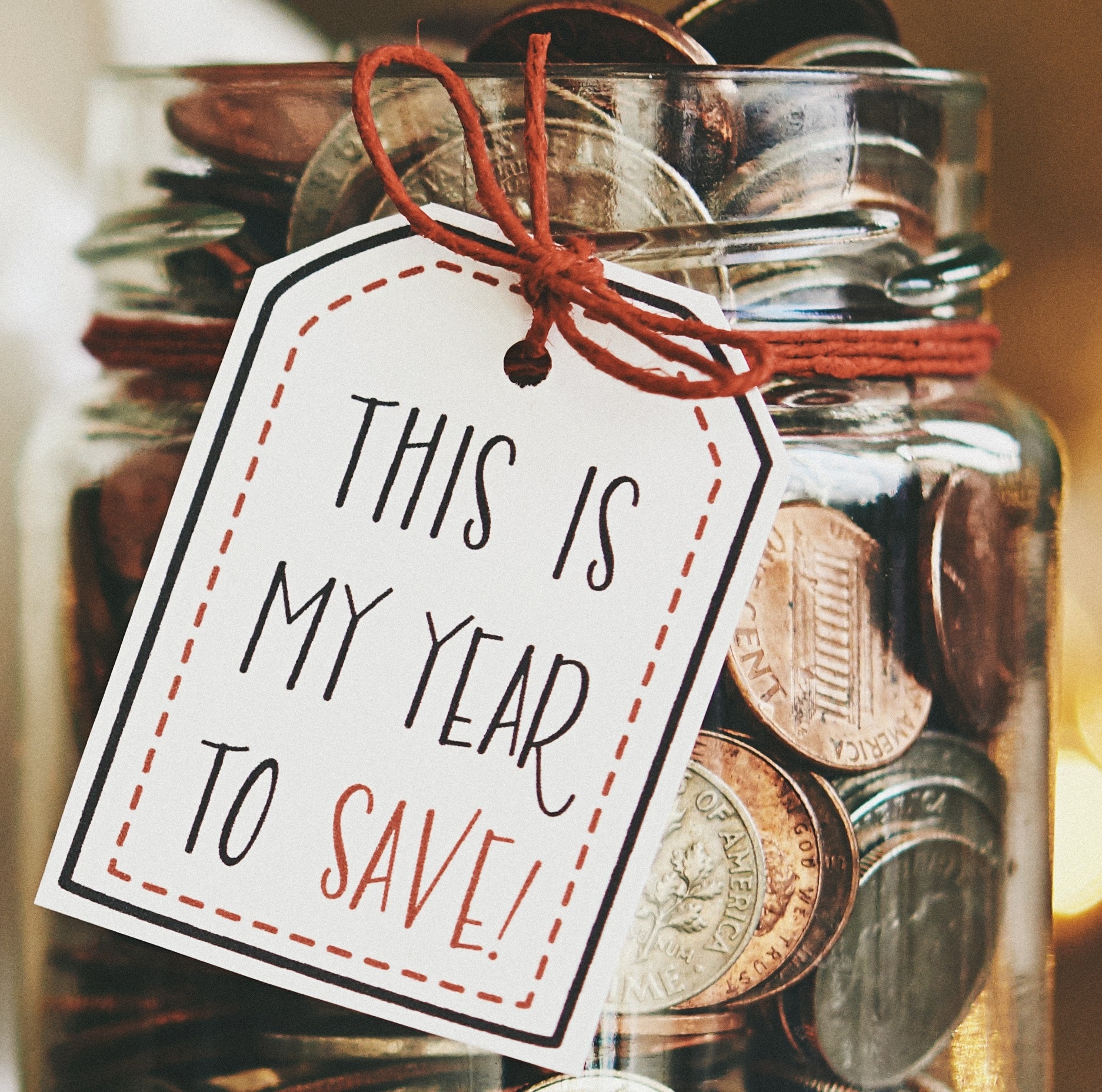 Jar with coins for budgeting 