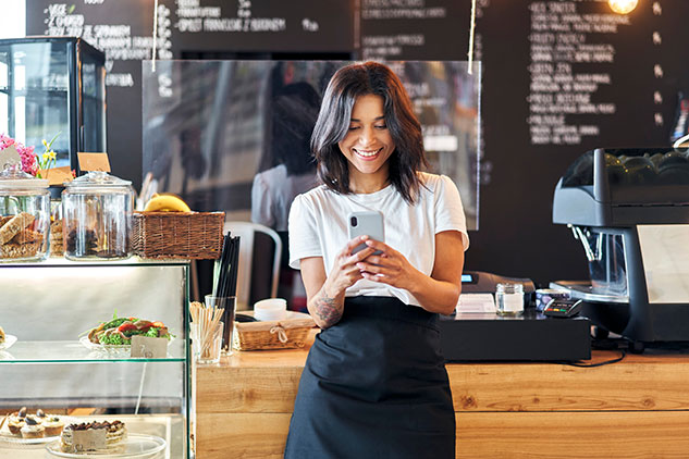 Small business owner using phone
