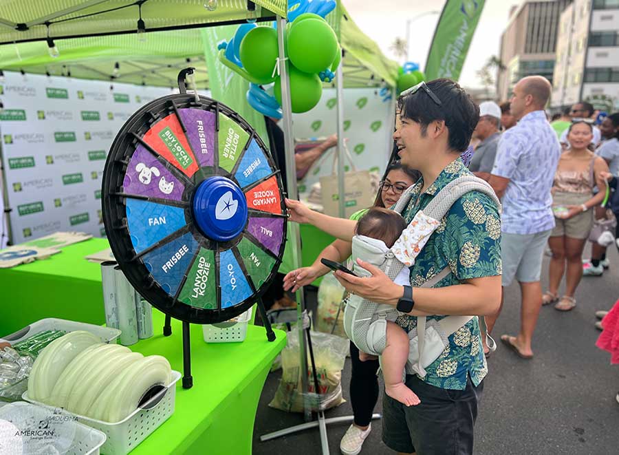 American Savings Bank Spin the Wheel at Booth