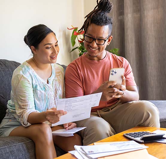 Couple looking at bills