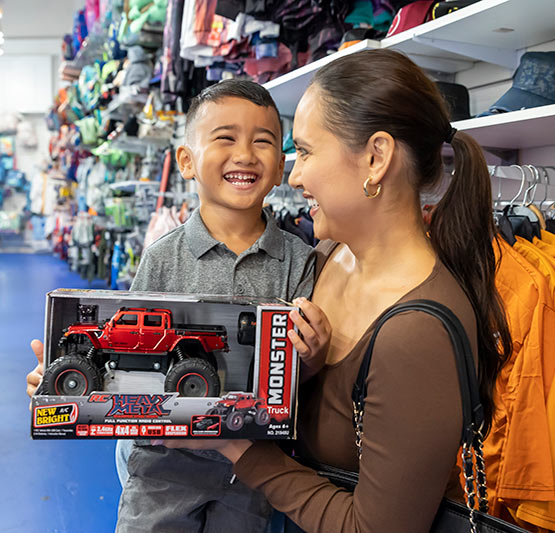 Mother and son in toy store