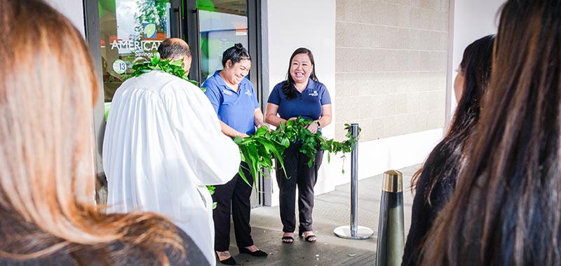 Teammates celebrating Hilo branch renovation