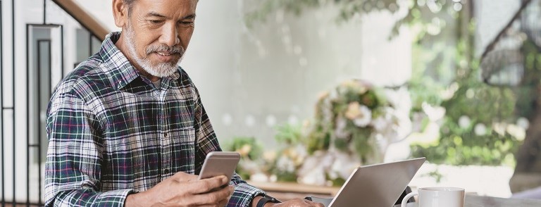 Man staying cybersecure on devices