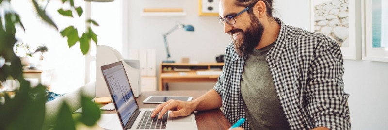 Male on a computer