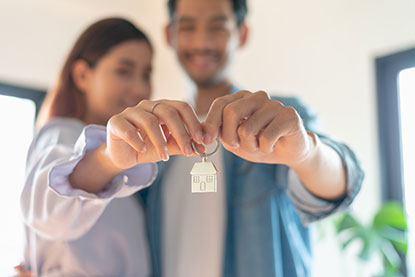 Couple holding  house keys