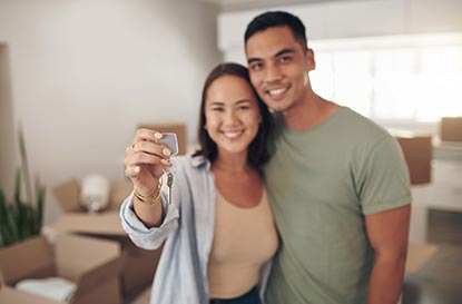 Couple holding keys - mortgage vs. rent thumbnail